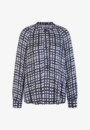 Long-sleeve navy blouse with white irregular square pattern, buttoned front placket, and gathered cuffs.