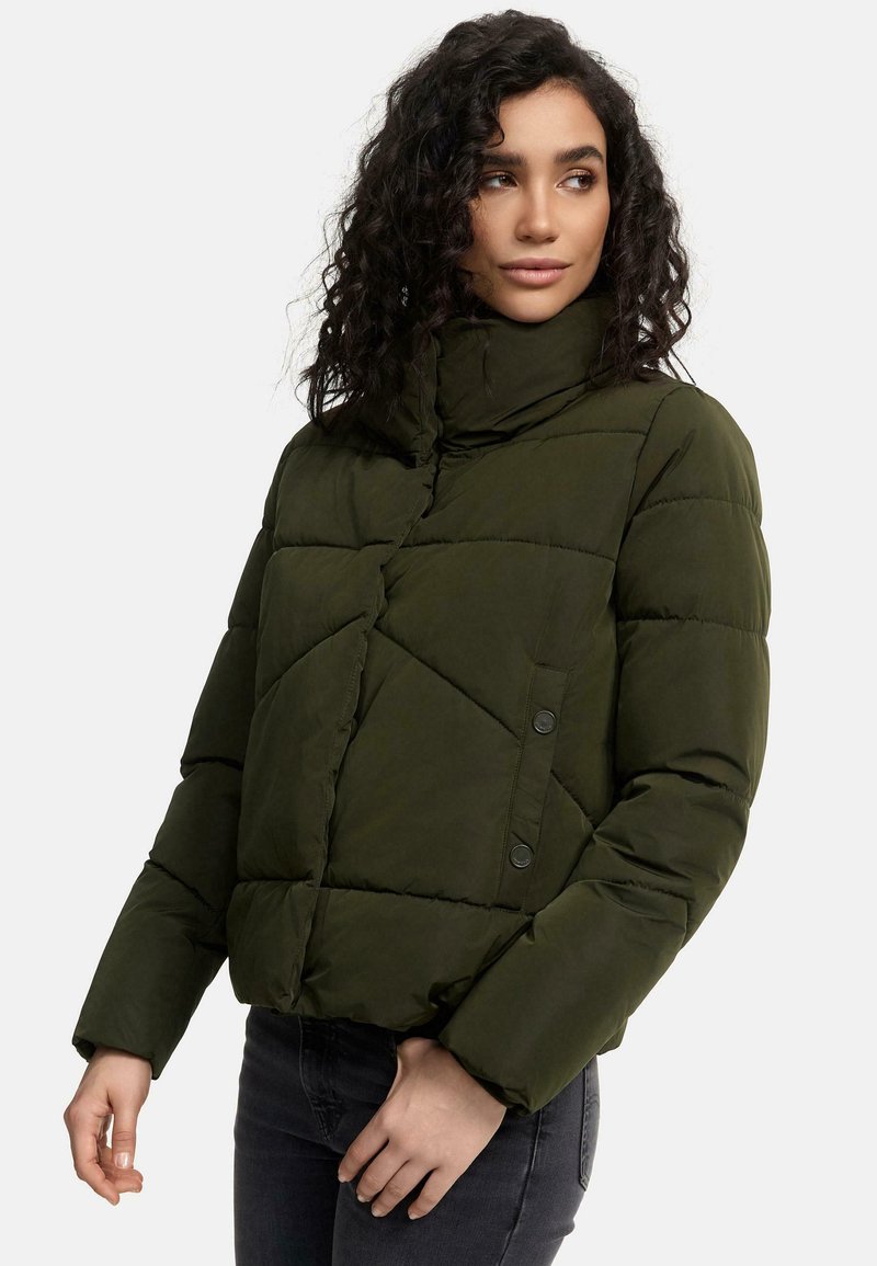 Olive green puffer jacket with a high collar, diagonal quilted pattern, and snap button details. Long sleeves and cropped fit.