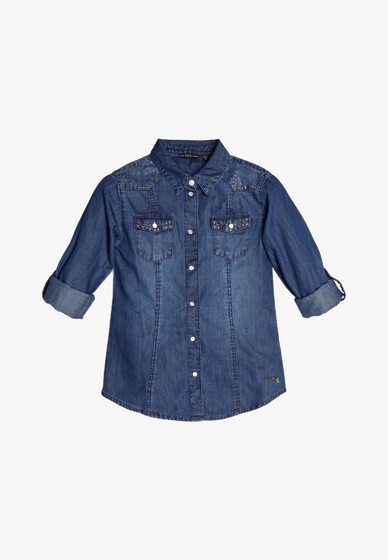 Denimowa koszula z długim rękawem i podwiniętymi mankietami, zapięcie na napy z przodu, dwie kieszenie na piersiach i zdobienia z ćwieków na ramionach oraz kieszeniach.