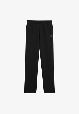 Zwarte joggingbroek met een elastische tailleband, slanke pasvorm en een klein logo op de bovenkant van het linkerbeen. Gladde stofstructuur.