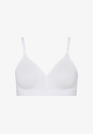 White wireless bra with a V-neck design, adjustable straps, and a smooth texture. Features a band with subtle branding detail.