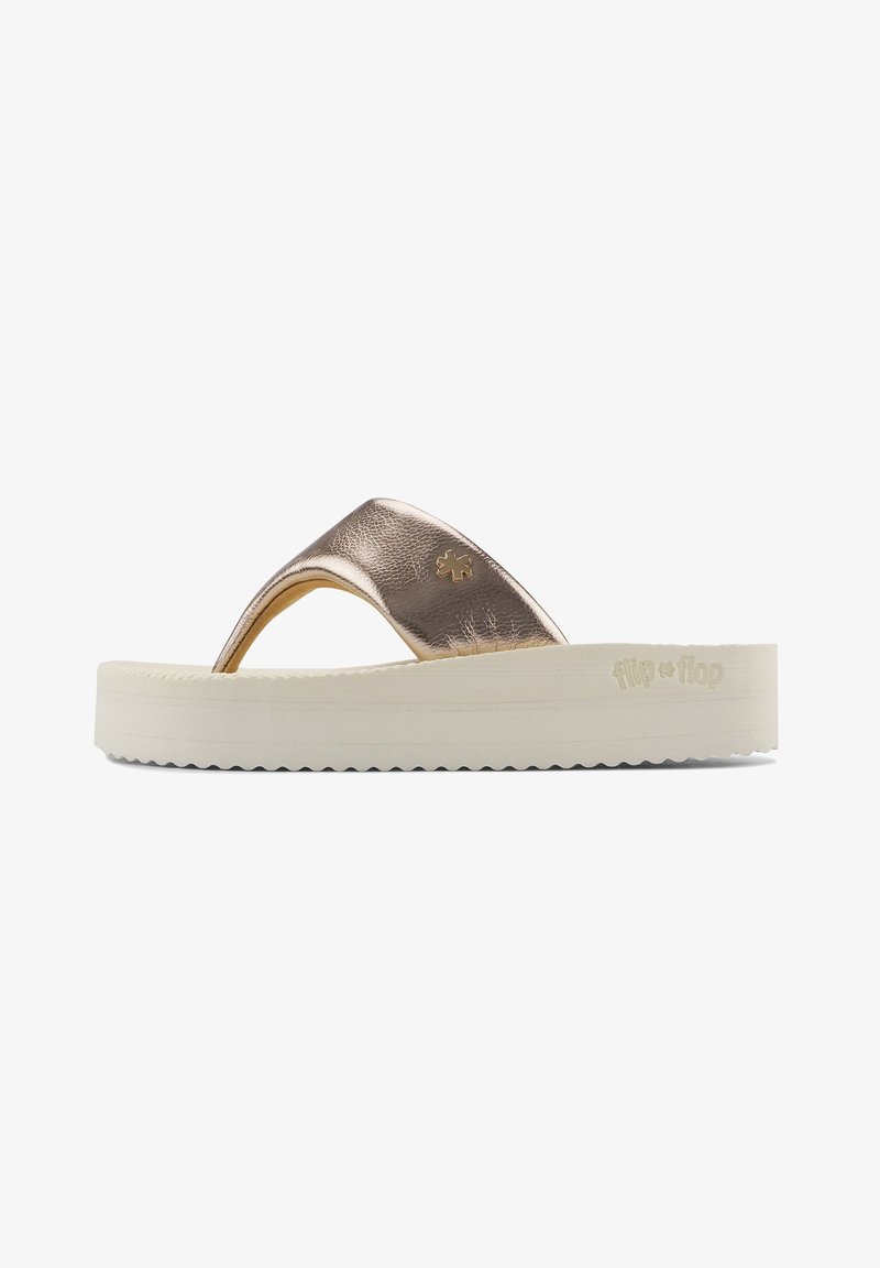 Metallic gold flip-flop sandal with a textured strap and a white rubber sole featuring serrated edges, branded with "flip * flop."