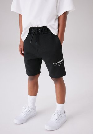 smALLSAINTS REGULAR FIT - Pantalones deportivos - black
