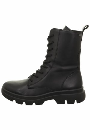 Botas de tobillo de cuero negro con cordones y suela gruesa, que presentan un acabado suave y ojales reforzados para mayor durabilidad.