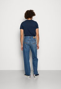 Nudie Jeans TUFF TONY - Calças de ganga de corte relaxado - coastal worn