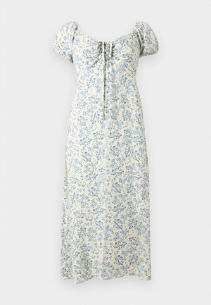 Abito midi color crema con stampa floreale blu, maniche a sbuffo, scollo quadrato arricciato e dettaglio annodato sul davanti.