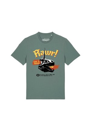 T-shirt vert avec un graphique d'un crâne de dinosaure noir crachant du feu, une corne de licorne et un texte indiquant "Rawr!" et "Cute & Furious."