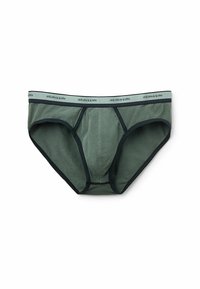 Grüne Baumwollslips mit einem schwarzen elastischen Bündchen, das mit dem "intimissimi"-Logo versehen ist. Einfaches Design mit glatter Textur und Fronttasche.
