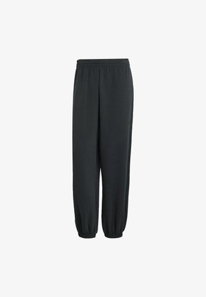 Pantaloni da jogging neri realizzati in materiale morbido, con vita elastica e polsini a sigaretta, progettati per comfort e vestibilità rilassata.