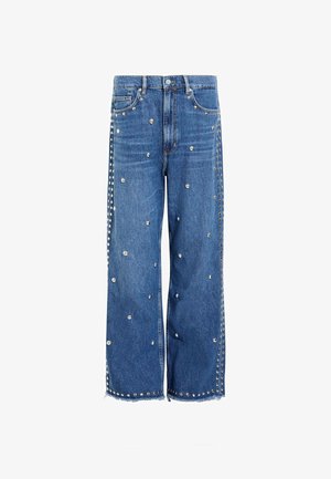 Light blue denim wide-leg jeans featuring silver studs scattered throughout, with studded side seams and frayed hem detailing.