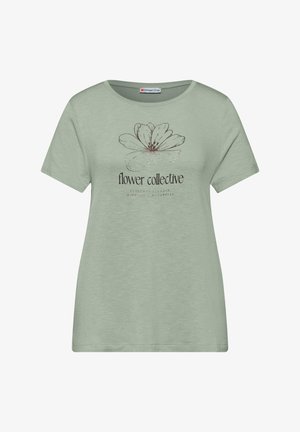 Camiseta de manga corta de color verde claro con una gran flor delineada en marrón y el texto "flower collective" impreso en el frente.