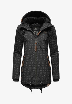 Svart mønstret jakke med sikksakk-design, glidelås foran, snor i hetta og lærdetaljer på lommer og mansjetter. Myk innvendig fôr.