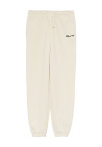 Cremefarbene Sweatpants aus weichem Material, mit elastischem Bund, einer Kordel zum Verstellen und gerippten Bündchen. Schwarzes "SLVR"-Logo auf der Vorderseite.