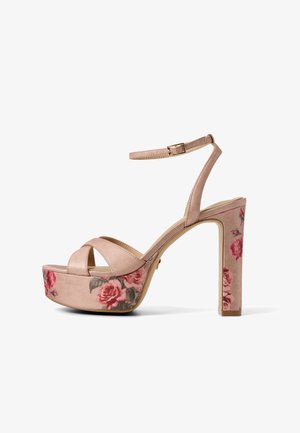 Beige high-heeled sandal with ankle strap and platform, decorated with pink rose floral patterns on heel and platform.