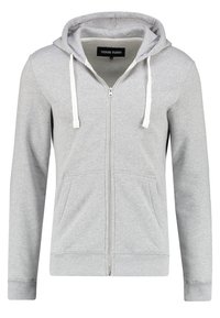 Felpa grigia con zip e coulisse, caratterizzata da una texture di tessuto morbido, tasche frontali e polsini a costine. Etichetta con la scritta "YOUR TURN", taglia M.
