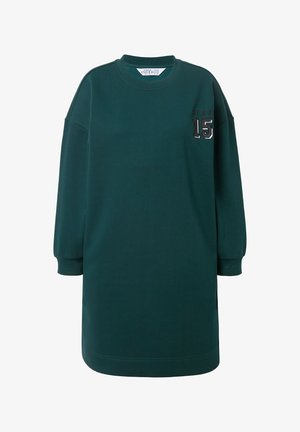 Mørkegrøn langærmet sweatshirtkjole med ribstrikkede manchetter og halsudskæring, med teksten "STUDIO 15" på øverste venstre bryst.