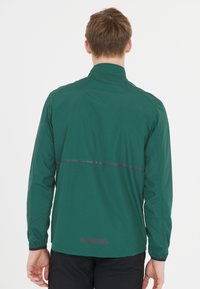 Endurance HUGOEE - Löparjacka - sea moss
