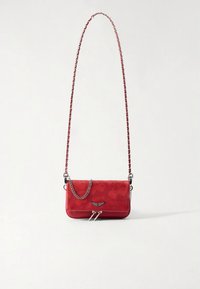 Red leather handbag with a chain strap, featuring a embossed cherry pattern and a decorative wing accent on the front.