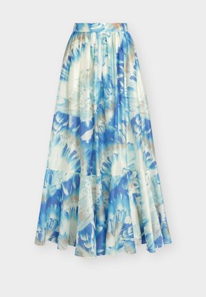 Jupe longue fluide avec motif floral abstrait bleu et blanc, taille froncée et ourlet à volants superposés sur un fond uni.