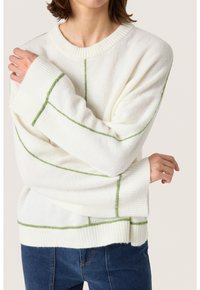 Hvid sweater med grønne vandret og lodret striber, ribbede manchetter og hals. Blødt stof, oversized pasform og struktureret finish.