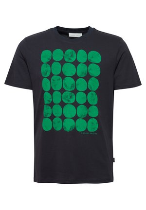 Black cotton t-shirt featuring a green circle pattern, textured design, crew neck, and short sleeves. Small "CASUAL FRIDAY" label at the bottom.