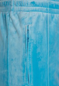 Juicy Couture TINA TRACK PANT - Calças de fato de treino - aqua
