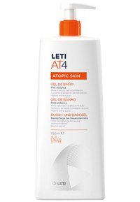 White plastic pump bottle with an orange pump cap, labeled "LET AT4 Atopic Skin Gel de Baño," contains 750 ml of body wash for sensitive skin.