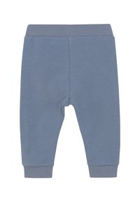 Helle blaue Jogginghosen aus weichem Stoff, mit einem elastischen Bund und gerippten Bündchen, einem glatten Textur und ohne Muster.
