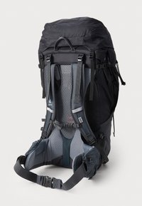 Black hiking backpack with a high, rounded top, padded mesh back, adjustable straps, and side pockets for storage. Durable material with sleek design.