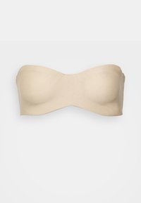 Beige strapless-bh med glatt, mjukt tyg, formade kupor och sömlös finish. Designad för komfort och stabilitet utan synliga band.