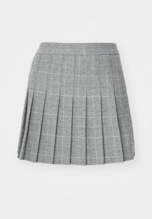 Jupe plissée en tissu gris à motif à carreaux. Elle présente une ceinture cintrée et plusieurs plis verticaux pour un look structuré.