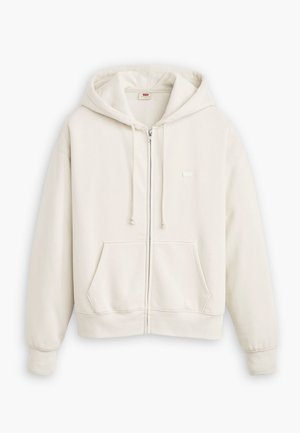 Lichtcreme zip-up hoodie gemaakt van zachte stof. Voorzien van een capuchon met trekkoord, voorzak en geribbelde manchetten. Minimale branding.