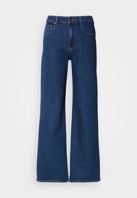 Dark blue denim wide-leg jeans with a high waist, five pockets, and orange stitching. Features a zipper fly and belt loops.