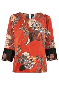 Blusa floreale rossa con maniche a tre quarti, caratterizzata da un polsino nero a contrasto e un dettaglio a chiave sul retro. Texture morbida e liscia.