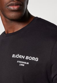 Björn Borg ESSENTIAL - Pamata T-krekls - black beauty