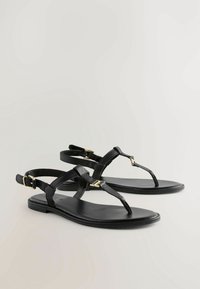 Unselected, mottled black
