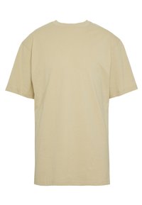 Beige bomuld t-shirt med rund hals og korte ærmer. Ryggen er ensfarvet, blød tekstur og afslappet pasform. Ingen synlige mønstre eller detaljer.