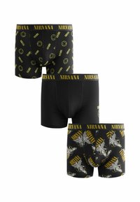 Boxers noirs avec le logo et les motifs jaunes de Nirvana : l'un avec un visage souriant, l'autre avec un motif d'étoiles, taille élastique avec marquage.