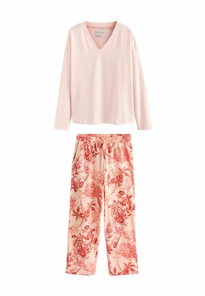 Vaaleanpunainen pitkähiha V-kaulainen paita yhdistettynä vaalean persikan ja punaisen sävyisiiin kukkakuosisiiin housuihin, joissa on joustava vyötärö ja sivutaskut.