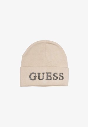 Berretto lavorato a maglia beige con risvolto caratterizzato dalla scritta "GUESS" in lettere color argento metallizzato. Tessuto morbido e testurizzato.