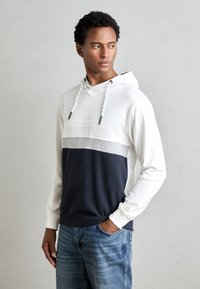 Felpa con cappuccio caratterizzata da un design multicolore: pannelli bianchi, grigi e blu navy; materiale in cotone; coulisse regolabili; polsini a coste.