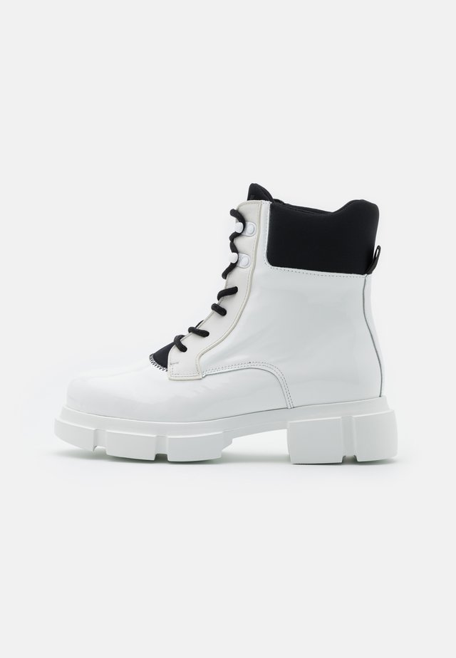 VELAR BOOT - Platform ankle boots - white