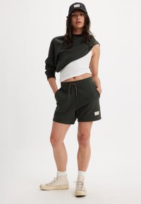 Levi's® PRIDE GRAPHIC UNISEX - Trainingsbroek - pirate black