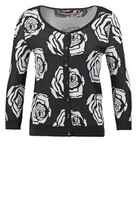 Cardigan noir boutonné avec motifs de roses blanches, manches longues, poignets et ourlet côtelés.