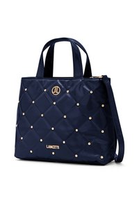 Borsa tote trapuntata in vernice blu navy con accessori color oro, decorata con borchie e logo. Include doppi manici e tracolla removibile.
