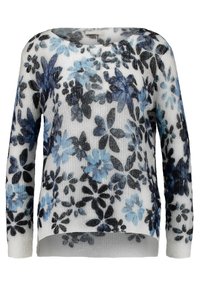 Pull léger en maille avec un col arrondi, présentant un motif floral bleu et noir sur fond blanc. Manches longues.