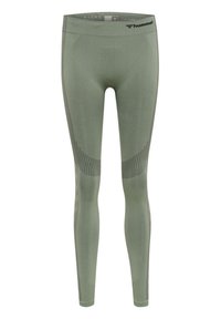 Leggings de sport vert clair en tissu extensible, dotés d'une taille haute, d'accents texturés et de motifs à pois le long des jambes.