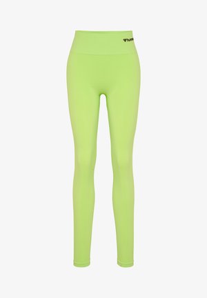 Leggings vert fluo avec une taille haute, fabriqués en tissu extensible, comportant un logo noir sur la taille. Texture lisse.