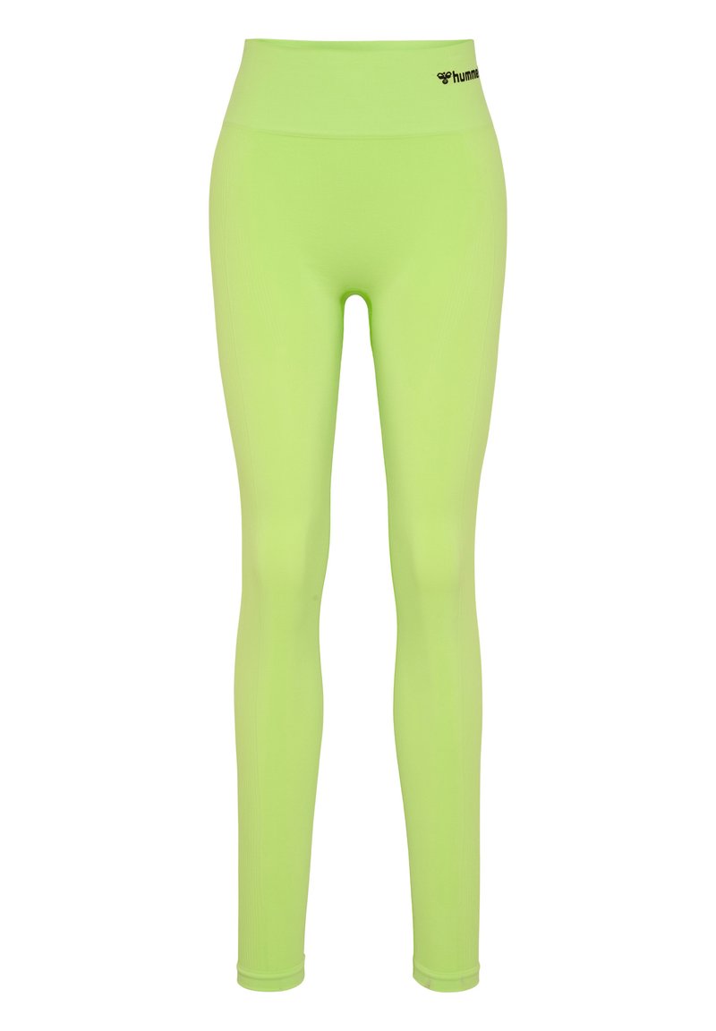 Neon gröna leggings med hög midja, gjorda av stretcht material, med en svart logotyp på midjan. Slät textur.