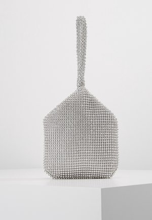 Silver beaded handbag with a structured design, featuring a flat base, a single loop handle, and a smooth, textured surface.
